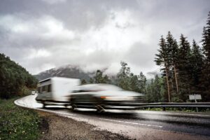 VR Caravan car travels on the highway.